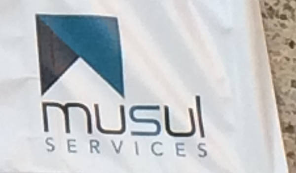 MUSUL Services logo on a banner