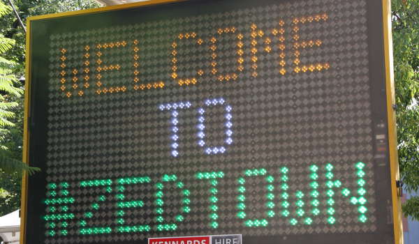 Illuminated sign saying "Welcome to #ZEDTOWN"